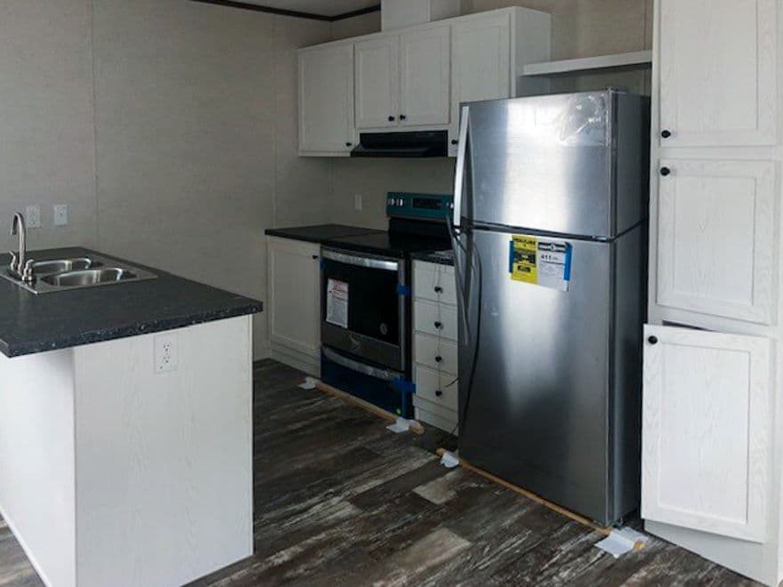 Wallboard 16 x 60 2 bed 2 bath 910 sq ft kitchen home features